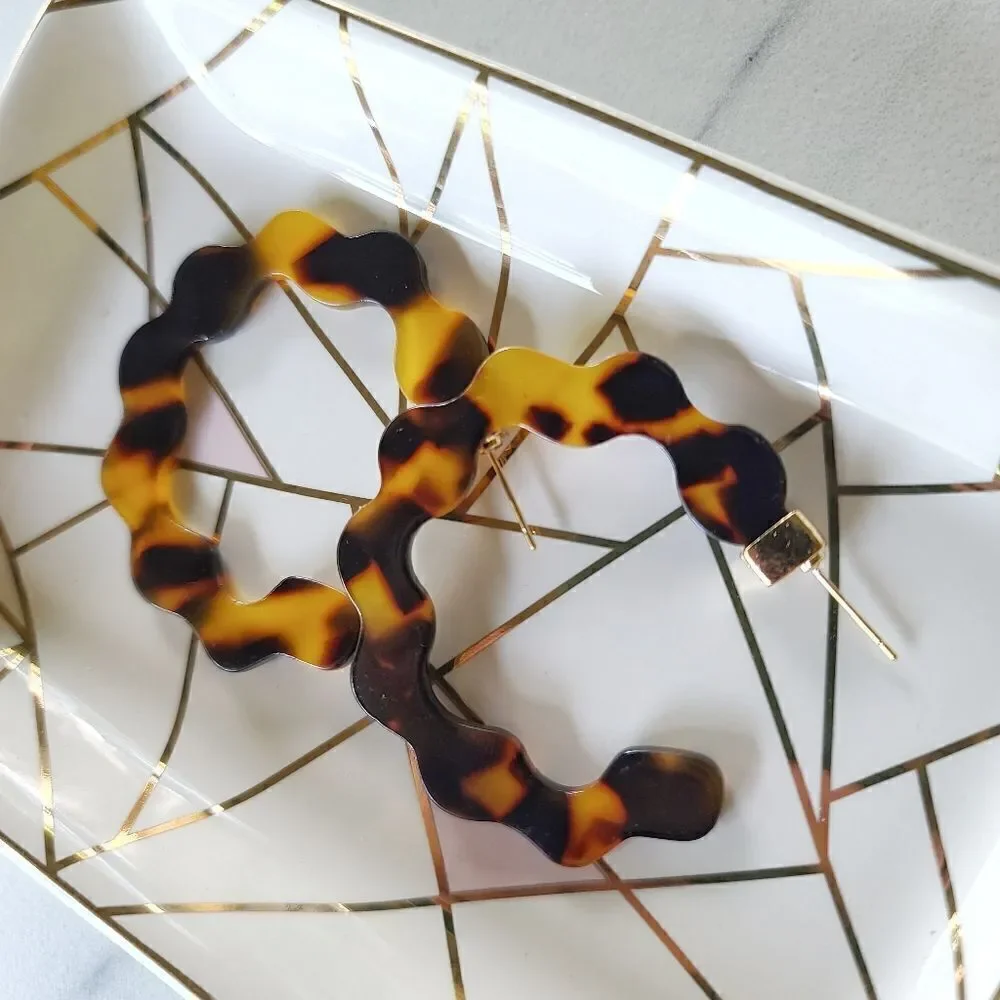 Wavy Resin Hoop Earrings in Dark Brown Tortoiseshell from BaubleBar